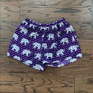 Purple elephant shorts.